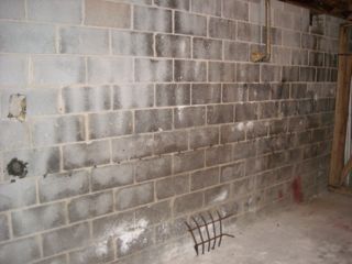 basement moisture problems concrete block wall