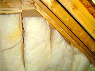 Attic kneewalls insulated with fiberglass batts create problems in many homes.