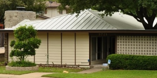 A reflective metal roof keeps an attic much cooler than passive ventilation