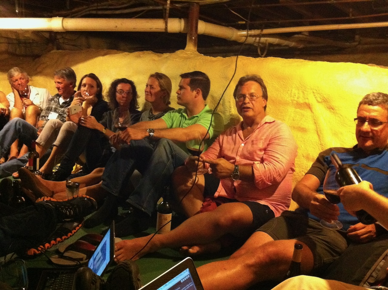 Drinking nice wine in Joe Lstiburek's encapsulated crawl space at Building Science Summer Camp