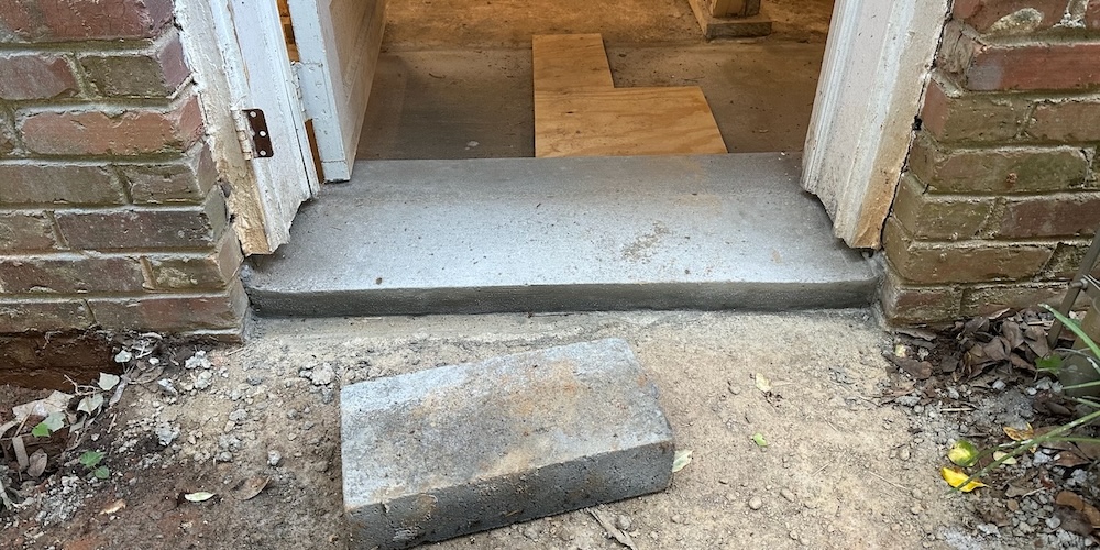 A New Concrete Curb At My Basement Door