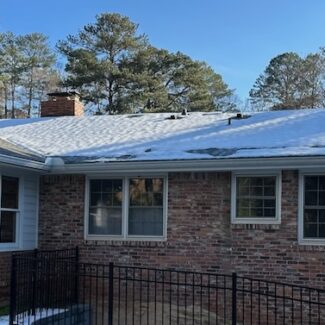 The North-facing Roof Of My House With A Lot Of Snow Remaining Two Days After The Storm